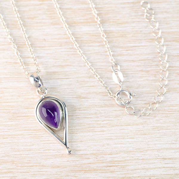 Silver and Cabochon Amethyst Tear Drop Pendant.