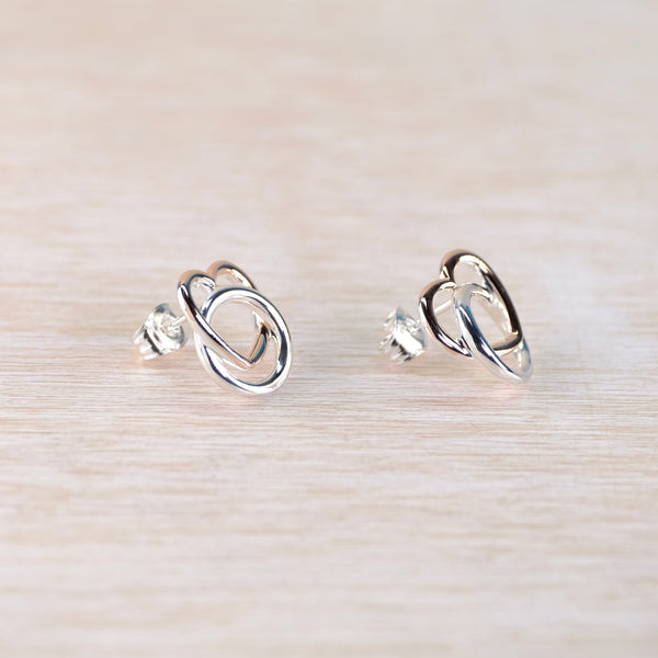 Silver and Rose Gold Heart Stud Earrings by 'Unique'
