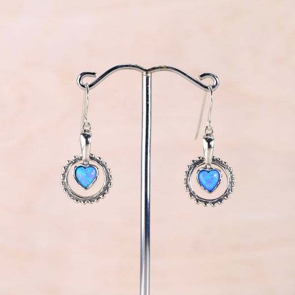 Decorative Silver Circle and Opal Heart Earrings.