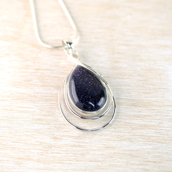 Sterling Silver and Blue Goldstone Pendant.