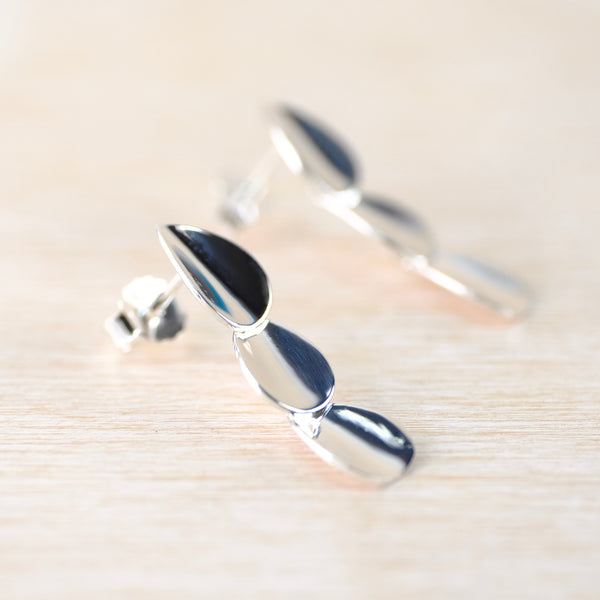 Three Tier Polished Silver Drop Earrings by JB Designs.