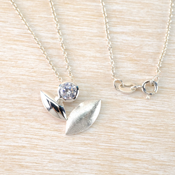 Satin Silver and Cubic Zirconia Pendant.