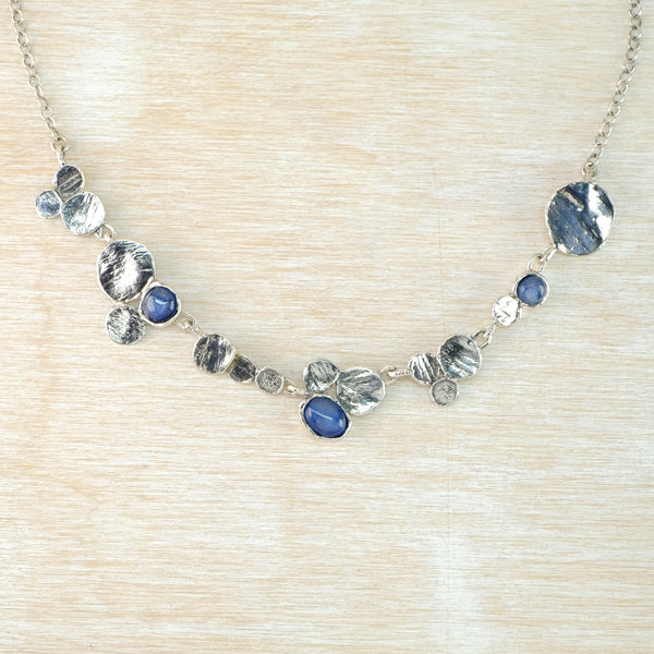 Organic Silver Disc and Kyanite Necklace by JB Designs.
