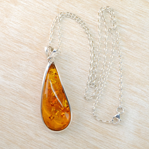 Long Tear Drop Amber and Silver Pendant.