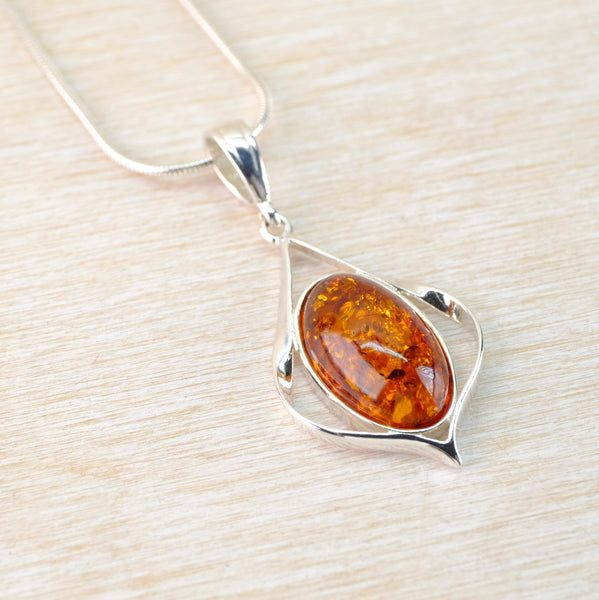 Elegant Amber and Silver Pendant.