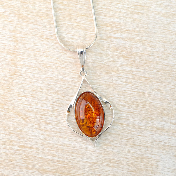 Elegant Amber and Silver Pendant.