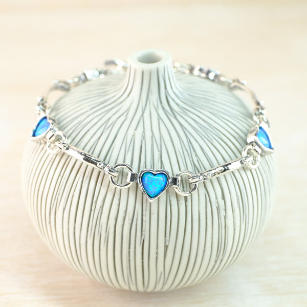 Silver and Opal Heart Linked Bracelet.