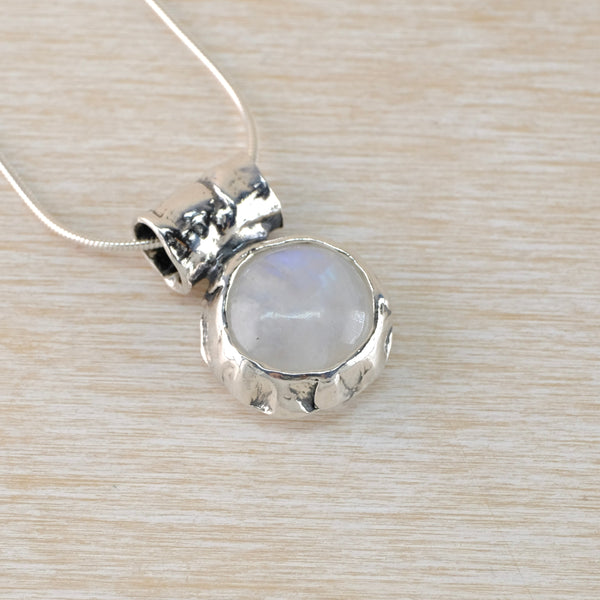 Round Textured Silver and Rainbow Moonstone Pendant.