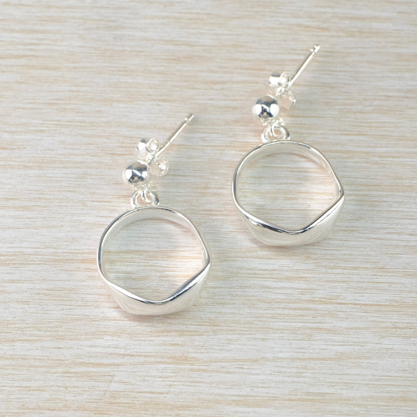 Organic Circular Silver Drop Earrings by JB Designs.