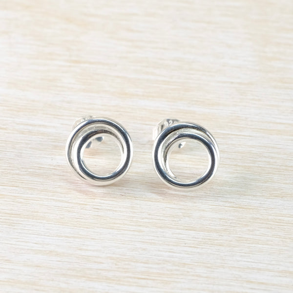 Circular Silver Stud Earrings by JB Designs.