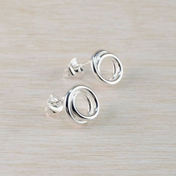 Circular Silver Stud Earrings by JB Designs.