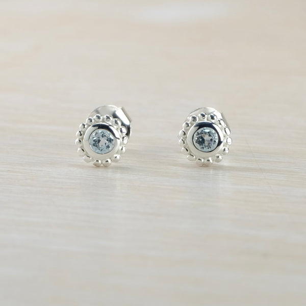 Small Silver and Blue Topaz Stud Earrings.