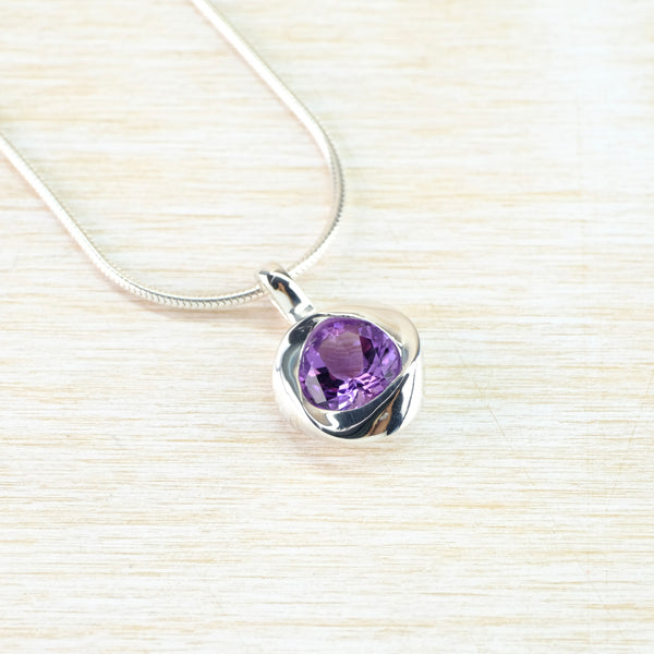 Faceted Amethyst and Sterling Silver Pendant.