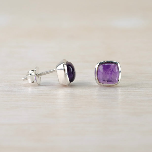Square Silver and Cabochon Amethyst Stud Earrings.