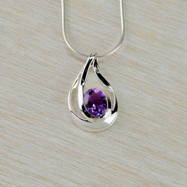 Elegant Shape Amethyst and Sterling Silver Pendant by JB Designs.