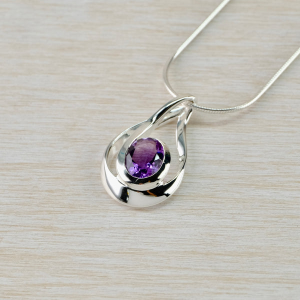 Elegant Shape Amethyst and Sterling Silver Pendant by JB Designs.