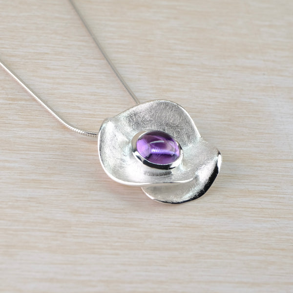 Round Amethyst and Textured Silver Pendant by JB Designs.