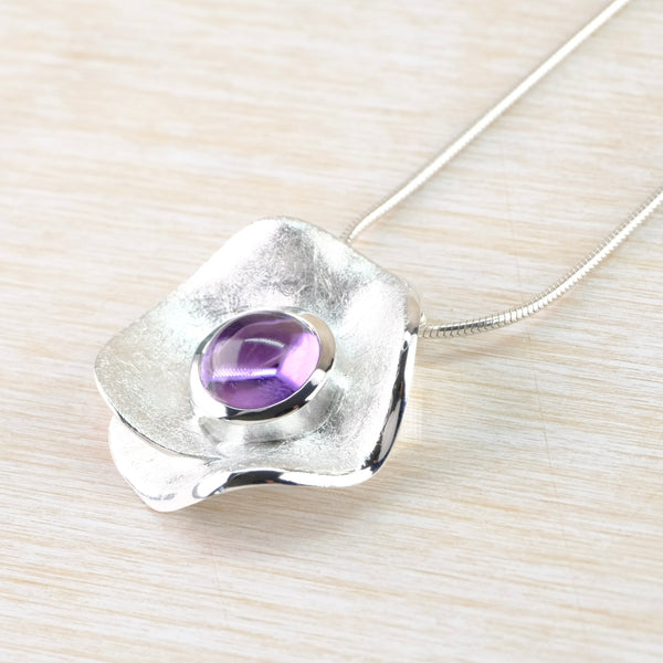 Round Amethyst and Textured Silver Pendant by JB Designs.
