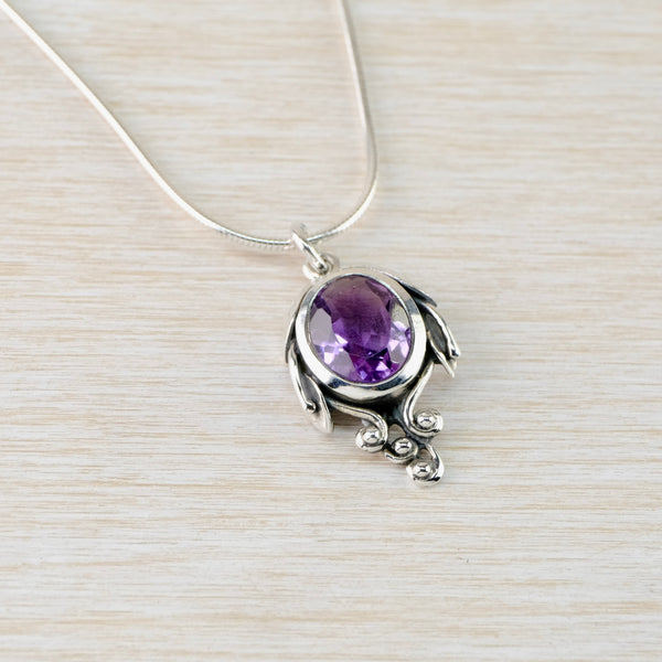 Art Nouveau Style Amethyst and Silver Pendant.