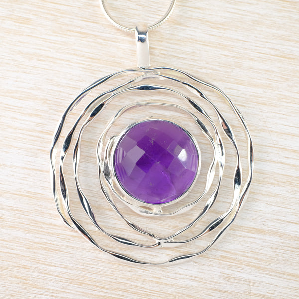 Sterling Silver Swirl and Faceted Amethyst Pendant.