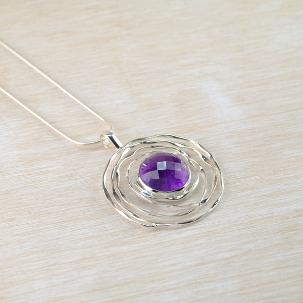 Sterling Silver Swirl and Faceted Amethyst Pendant.