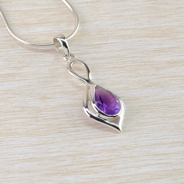 Decorative Sterling Silver and Tear Drop Amethyst Pendant.