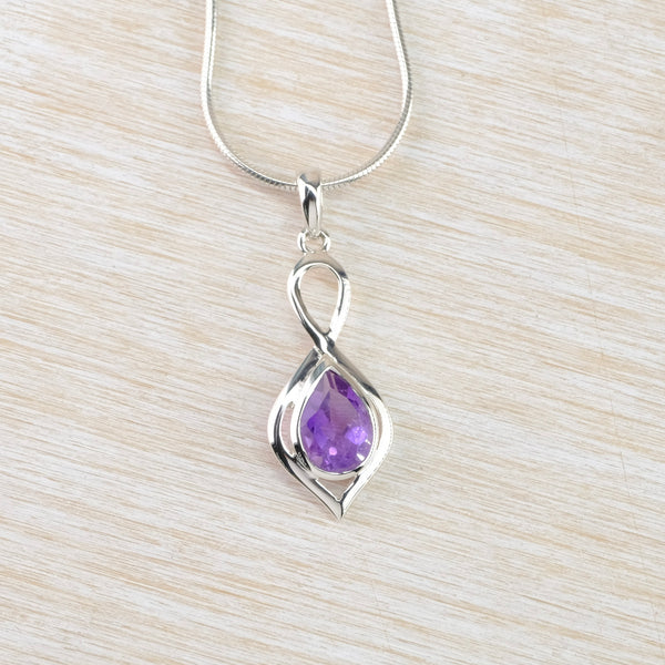 Decorative Sterling Silver and Tear Drop Amethyst Pendant.
