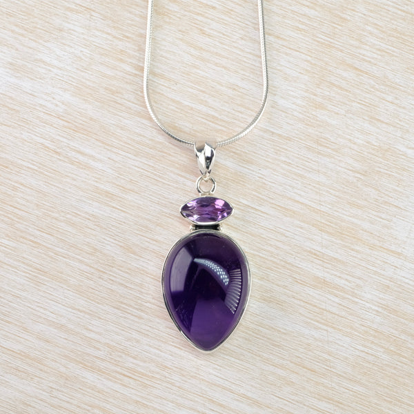 Two Stoned Silver and Amethyst Pendant.