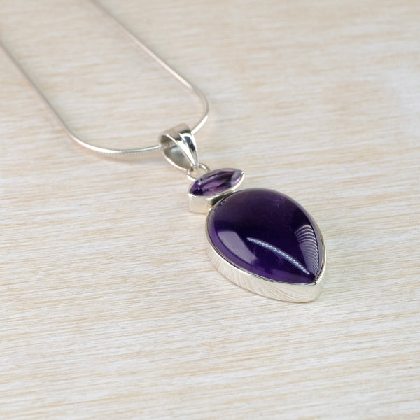 Two Stoned Silver and Amethyst Pendant.