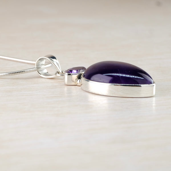 Two Stoned Silver and Amethyst Pendant.