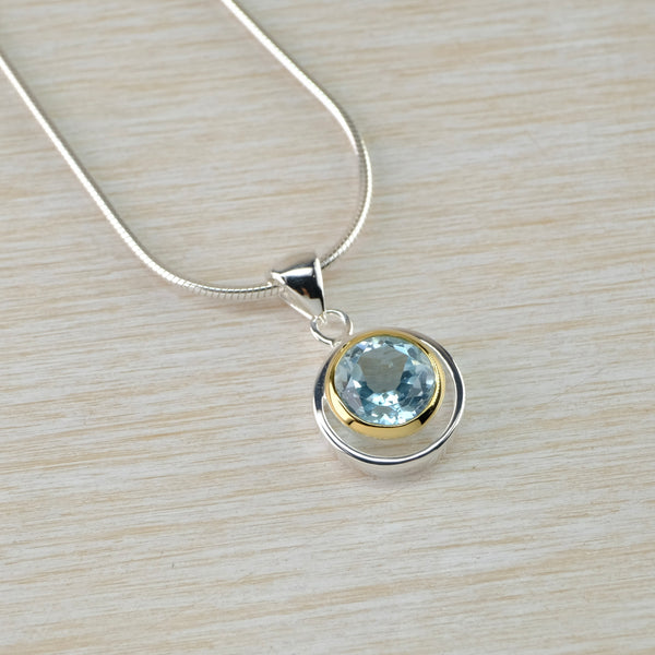 Blue Topaz and Silver and Gold Plated Pendant.