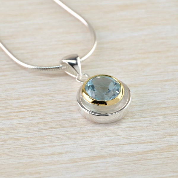 Blue Topaz and Silver and Gold Plated Pendant.