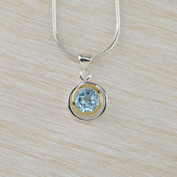 Blue Topaz and Silver and Gold Plated Pendant.