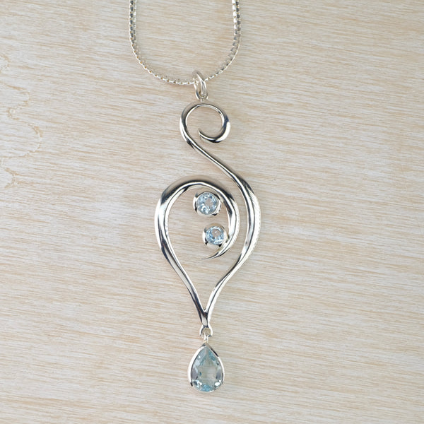 Triple Stone Blue Topaz and Silver Pendant.