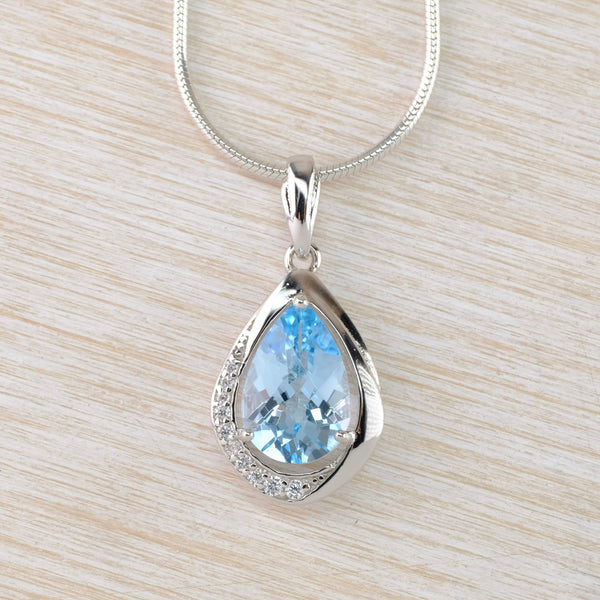 Blue Topaz, Cubic Zirconia and Silver Pendant.