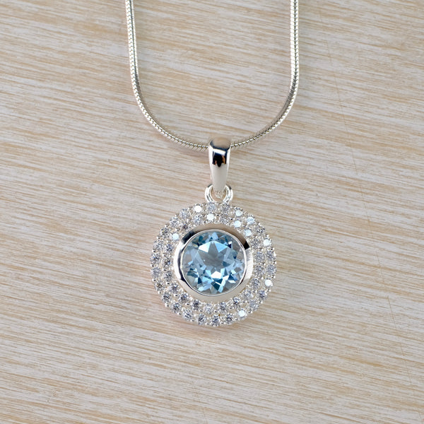 Blue Topaz, Cubic Zirconia and Sterling Silver Pendant.