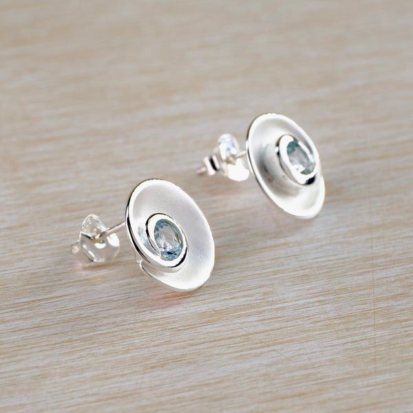 Silver and Blue Topaz Swirl Stud Earrings by JB Designs.
