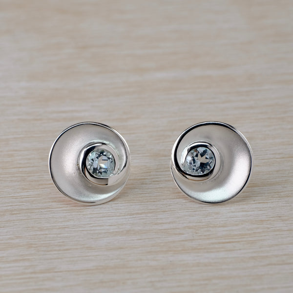 Silver and Blue Topaz Swirl Stud Earrings by JB Designs.
