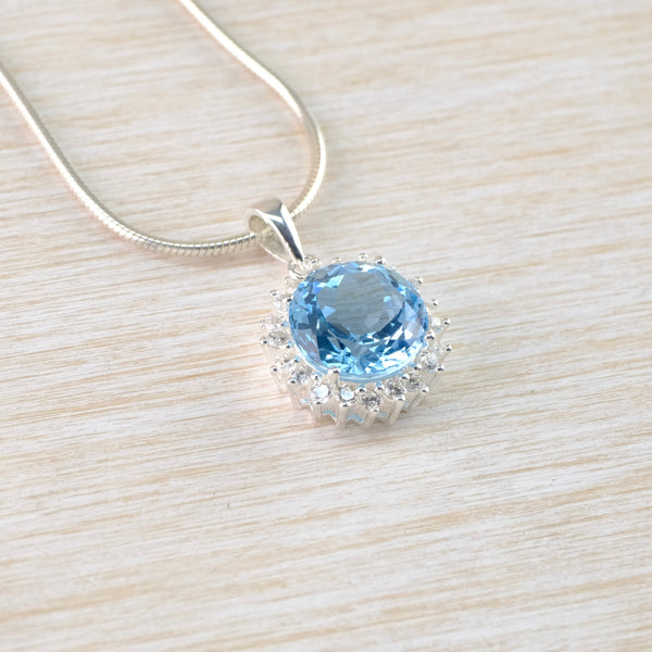 Blue Topaz, Cubic Zirconia and Silver Pendant by JB Designs.