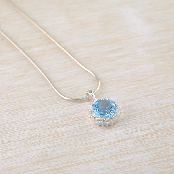 Blue Topaz, Cubic Zirconia and Silver Pendant by JB Designs.