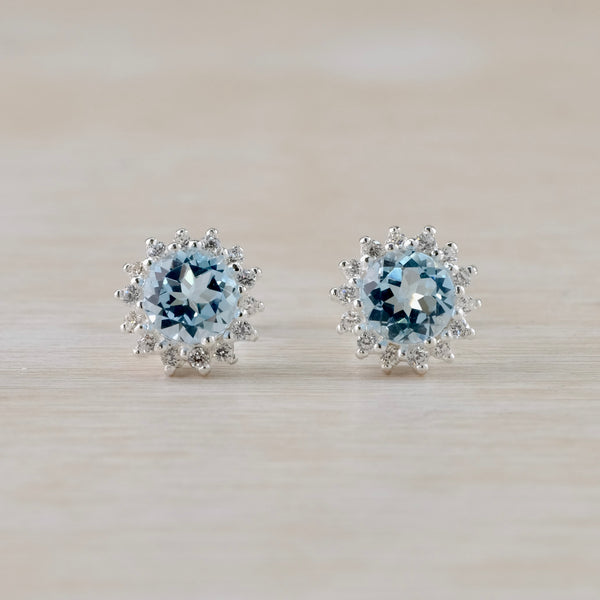 Silver, Blue Topaz and CZ Stud Earrings by JB Designs.