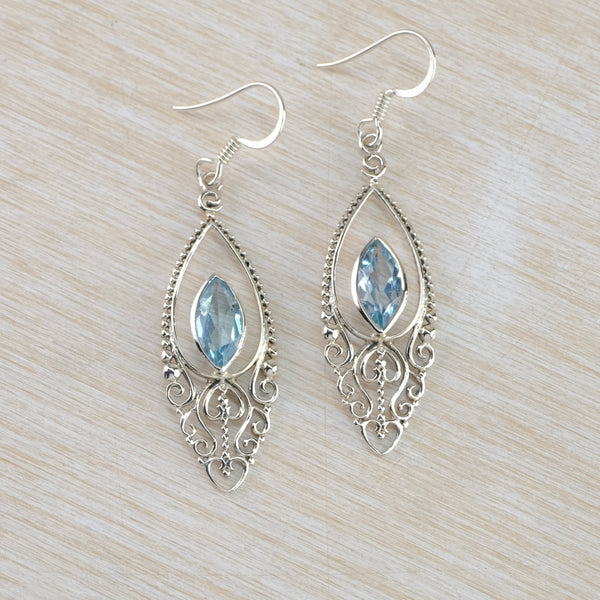 Ornate Silver and Blue Topaz Drop Earrings.