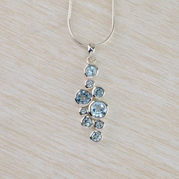 Multi Stone Blue Topaz and Silver Pendant.