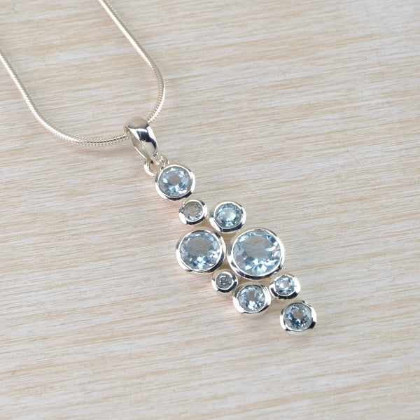 Multi Stone Blue Topaz and Silver Pendant.