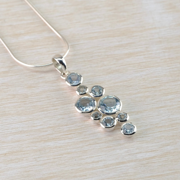 Multi Stone Blue Topaz and Silver Pendant.