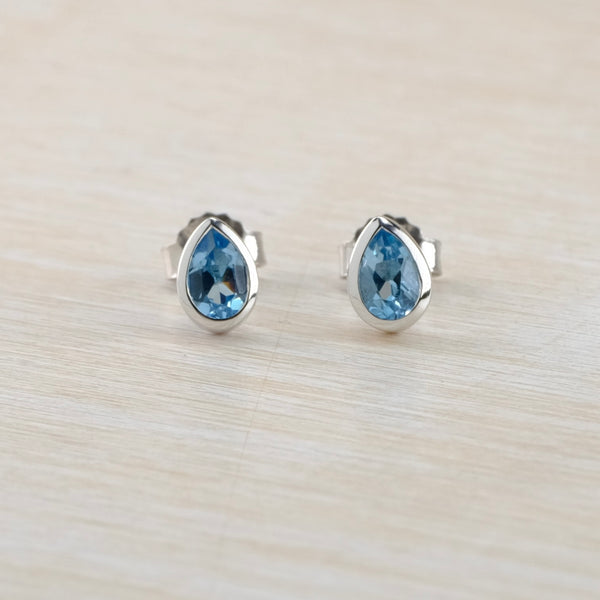 Tear Drop Blue Topaz and Silver Stud Earrings by JB Designs.