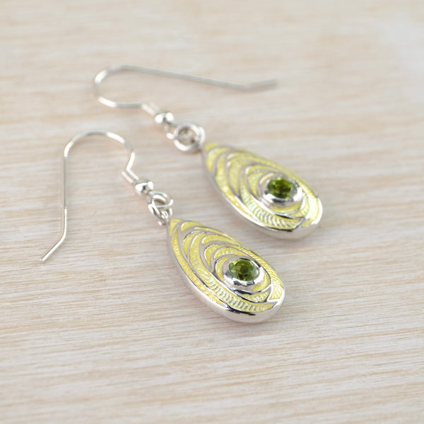 Silver, Yellow Enamel and Peridot Drop Earrings by Nicole Barr.