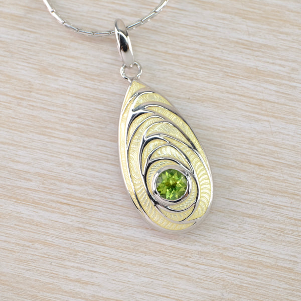 Silver, Yellow Enamel and Peridot Pendant by Nicole Barr.