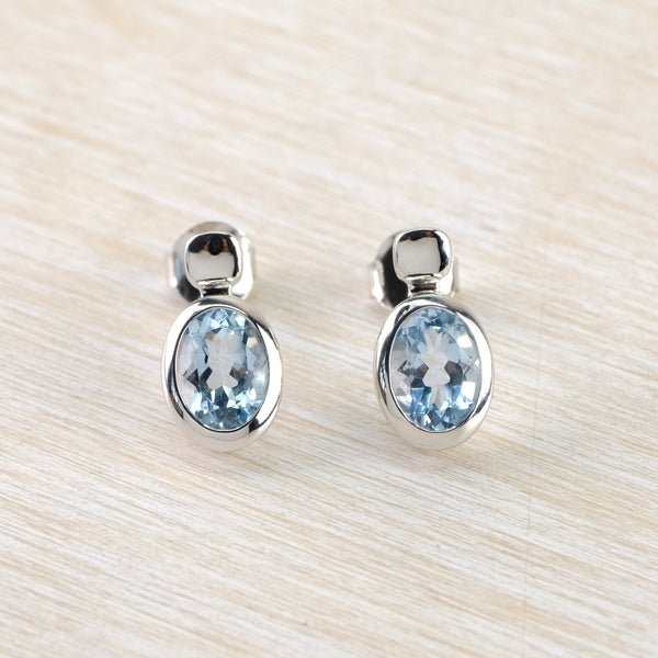 Oval Blue Topaz and Silver Stud Earrings by JB Designs.