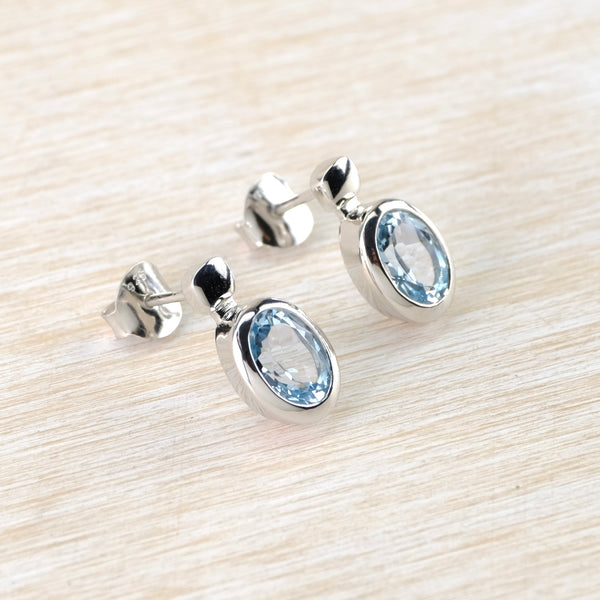 Oval Blue Topaz and Silver Stud Earrings by JB Designs.